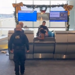 woman throws computer monitor at gate agent after missing flight in chaotic footage