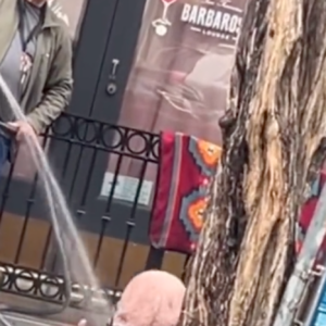raging mad residents livid over viral video of business owner viciously spraying water on homeless woman