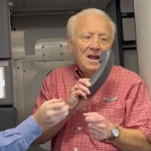 this cant be real elderly man moved to tears after being made an honorary flight attendant in emotional video