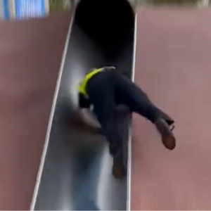 watch boston police officer gets wrecked after riding childrens slide in city hall plaza